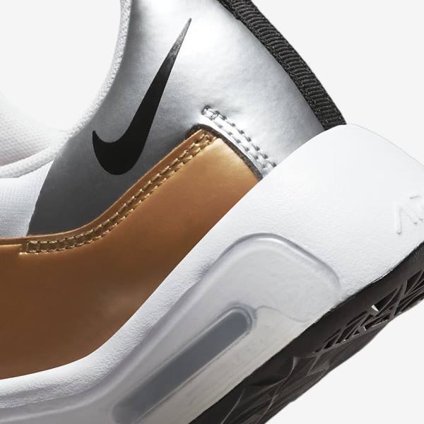 Nike Air Max Bella TR 5 Naisten Treenikengät Valkoinen Metal Hopea Metal Kultaiset Mustat | NK307ZCJ