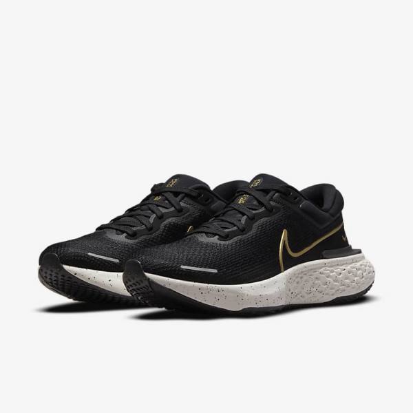 Nike ZoomX Invincible Run Flyknit Maantie Miesten Juoksukengät Mustat Metal Kultaiset | NK608FAQ